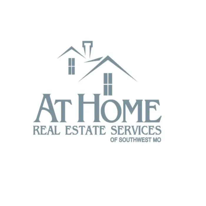 At Home Real Estate Services logo